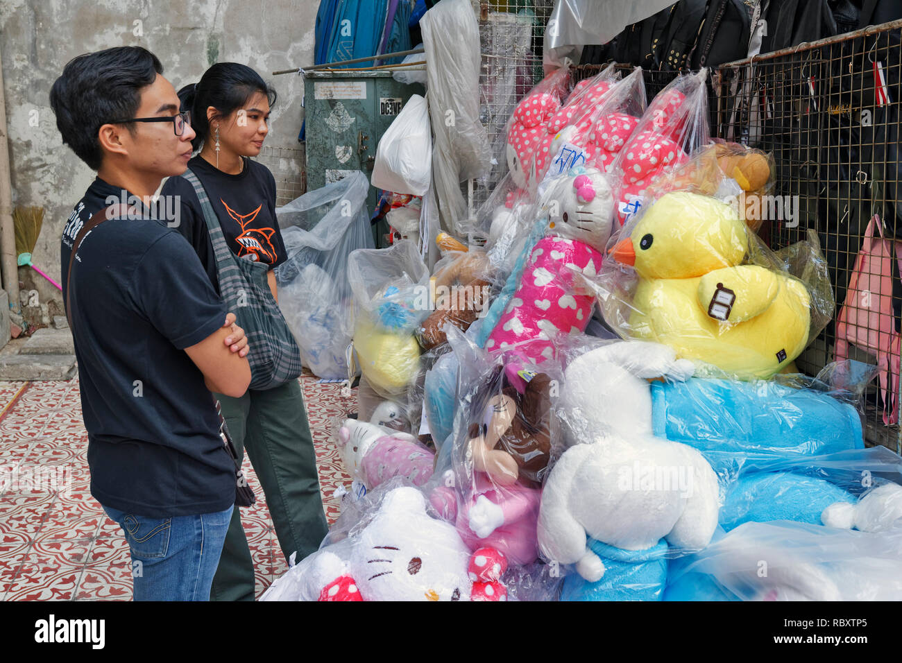 choose a stuffed animal in small street of chinatown, Bangkok, thailand Stock Photo