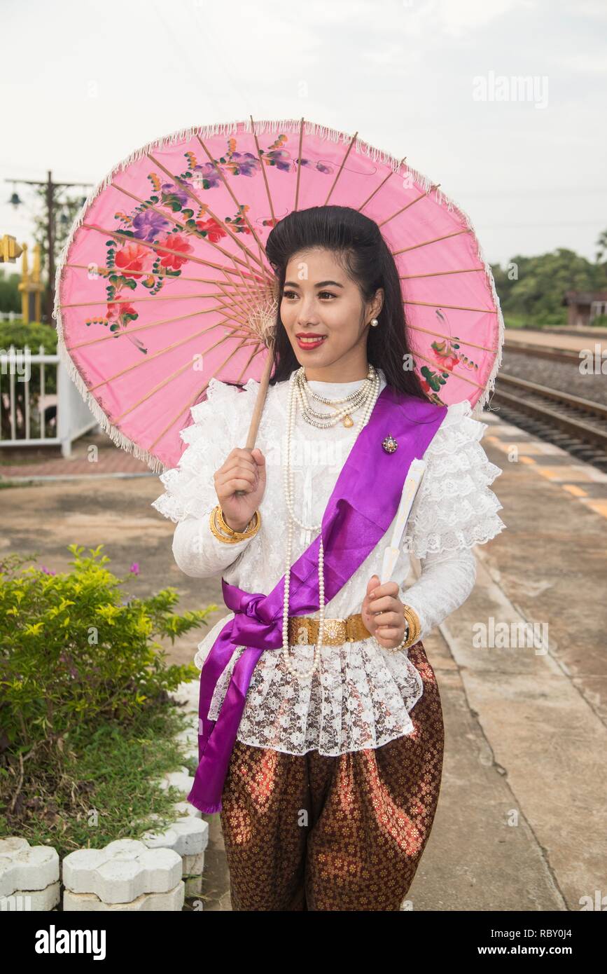 The lady in Middle Thai classical Thai traditional dress suit standing ...