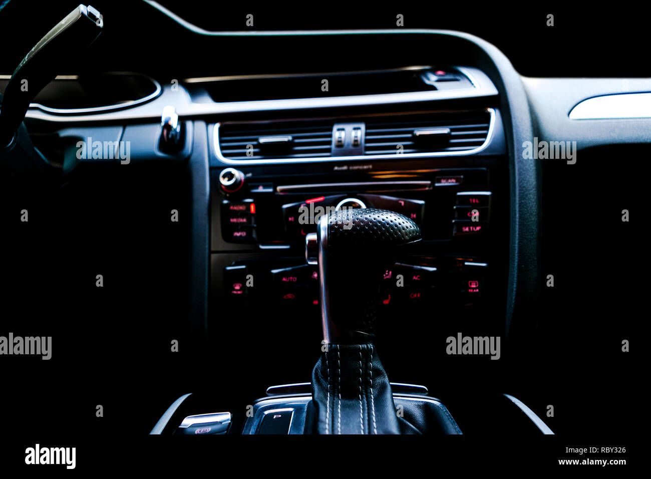 Modern Luxury sport car inside. Interior of prestige car. Black Leather