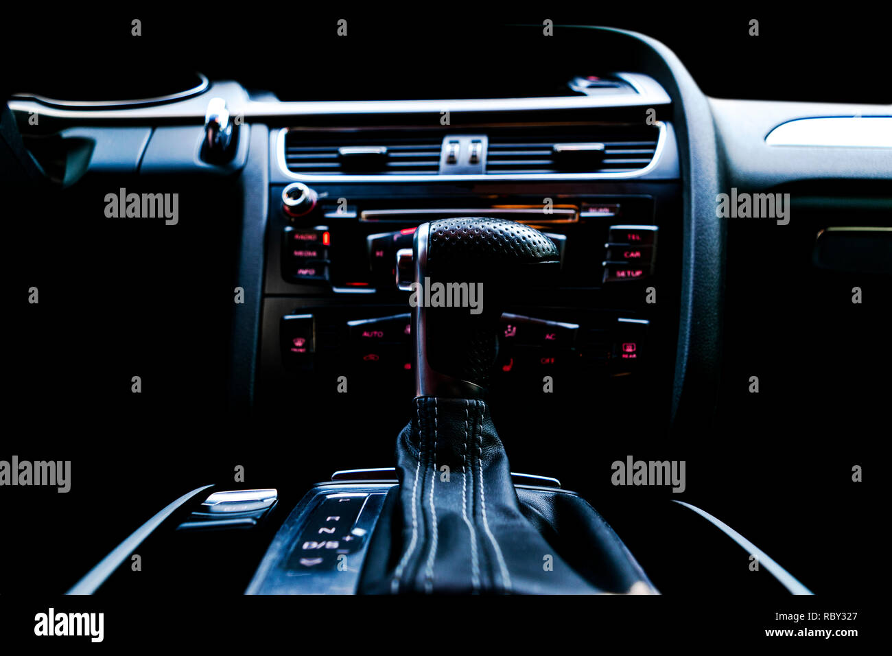 Modern Luxury sport car inside. Interior of prestige car. Black Leather