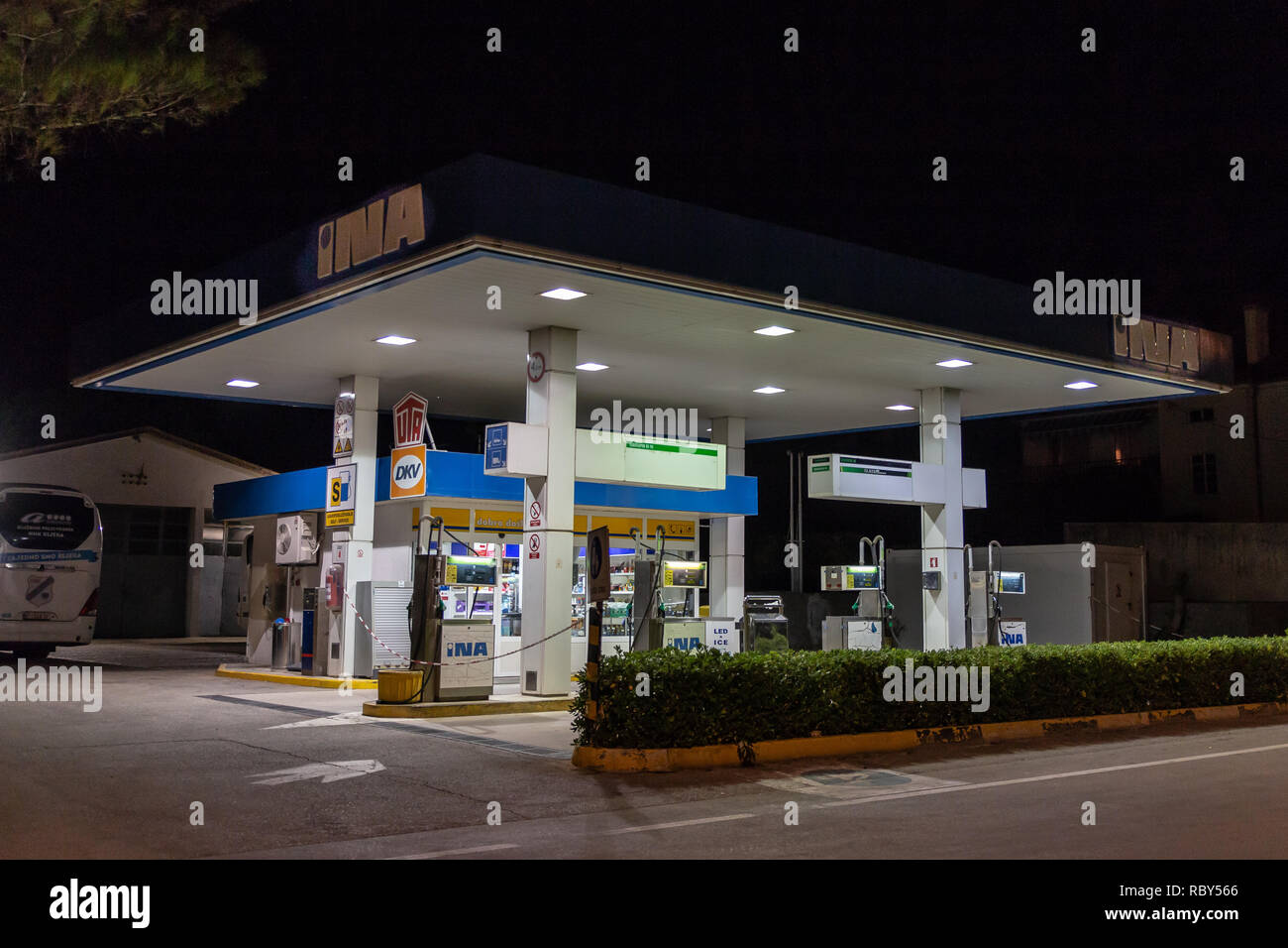 Closed INA petrol station at night. Krk, Kvarner, Croatia. Stock Photo