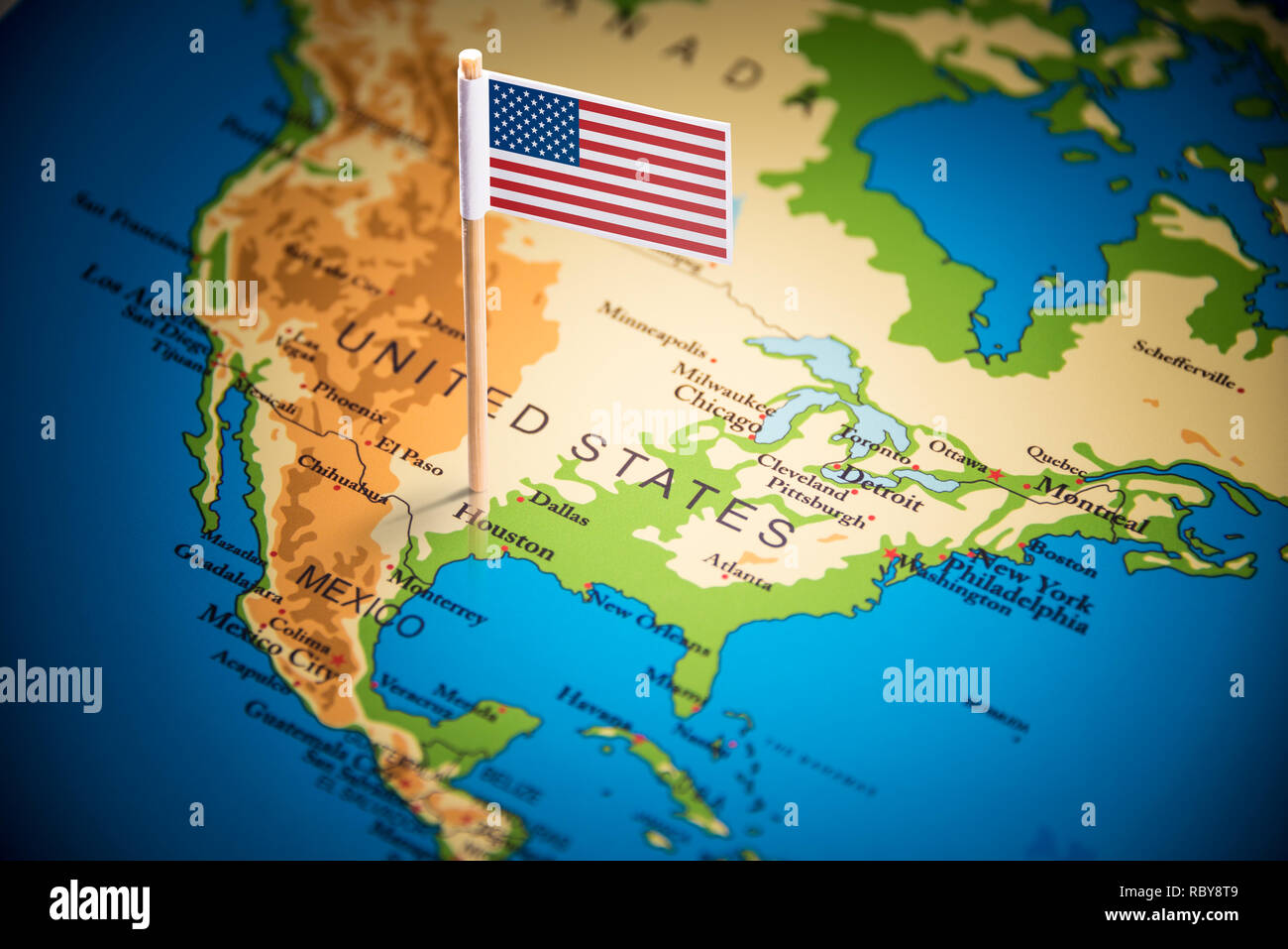 USA marked with a flag on the map Stock Photo