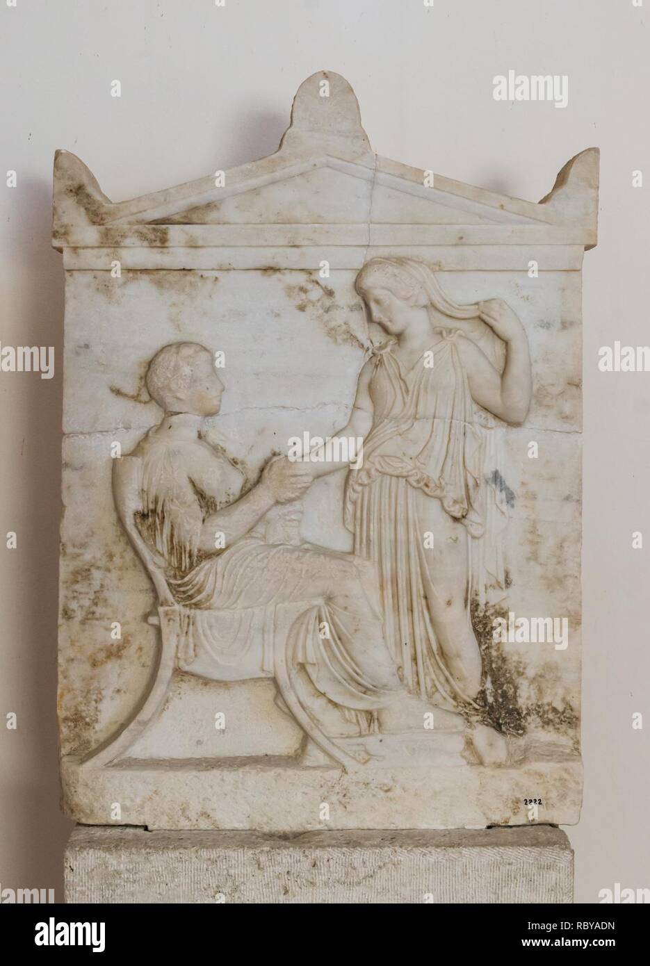 Aegina funerary relief rich style dexiosis 5th century BCE. Stock Photo