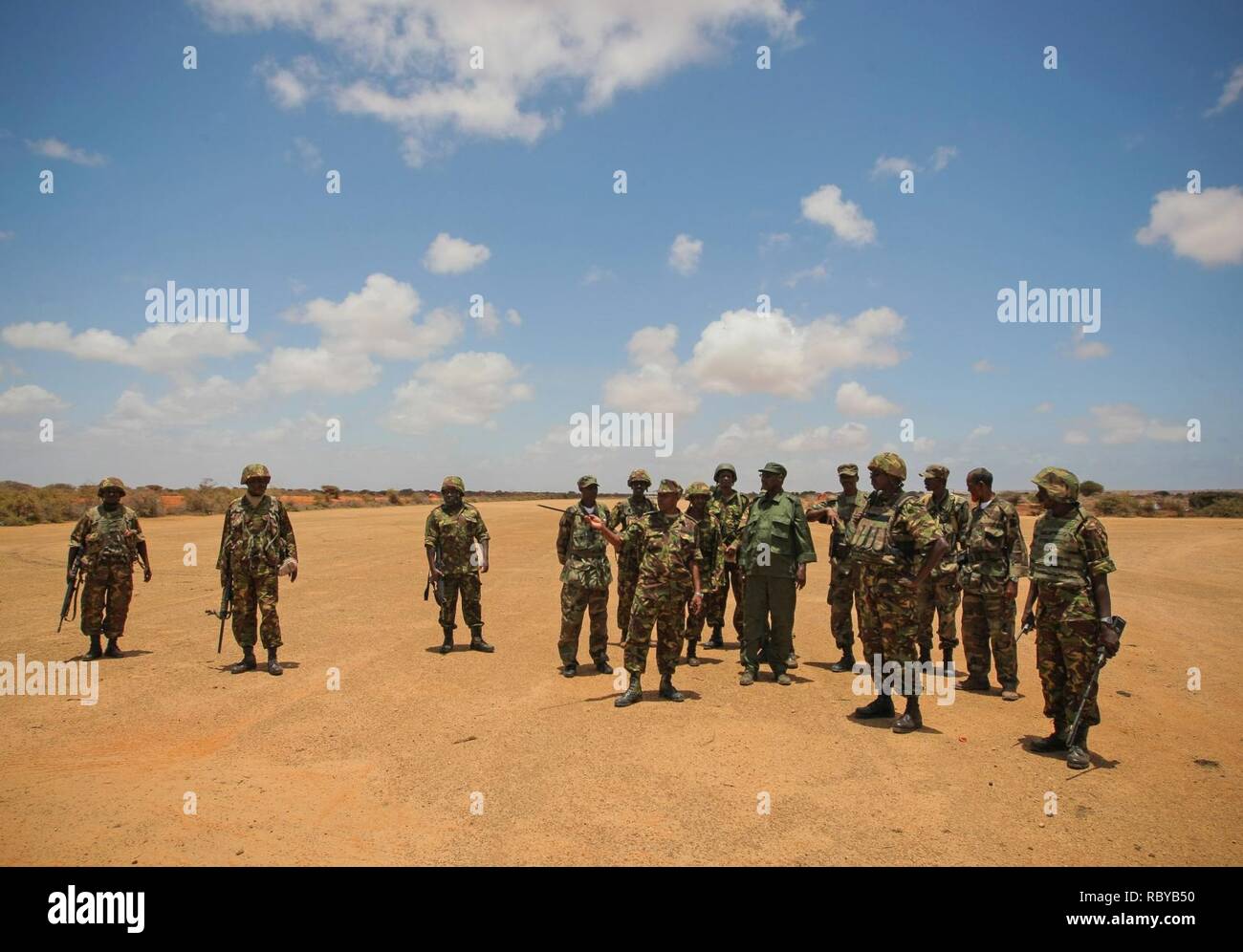 SOMALIA, Kismayo: 04 October, senior commanders of the Kenyan Contingent of the African Union Mission in Somalia (AMISOM) and the Somali National Army (SNA) inspect the runway at Kismayo airport. Kismayo, the last bastion of the once feared Al-Qaeda-affiliated extremist group Al Shabaab, fell after troops of the Somali National Army (SNA) and the pro-government Ras Kimboni Brigade milita supported by the Kenyan Contigent of the African Union Mission in Somalia (AMISOM) entered the port city on 02 October following a two month operation across southern Somalia which saw the liberation of villag Stock Photo