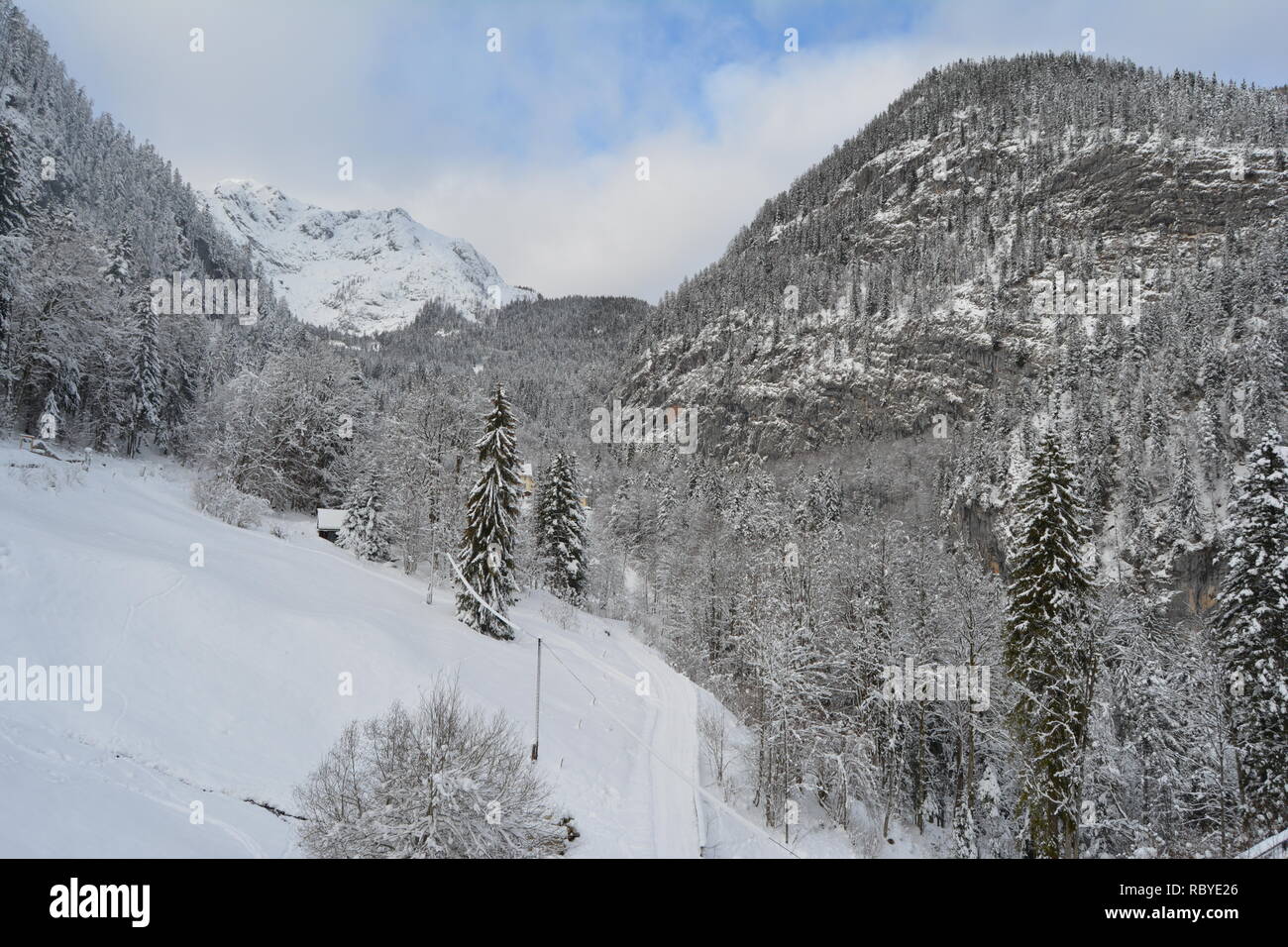 Hallstatt, Austria in winter Among  the snowy mountains of Hallstatt. Top view. Stock Photo