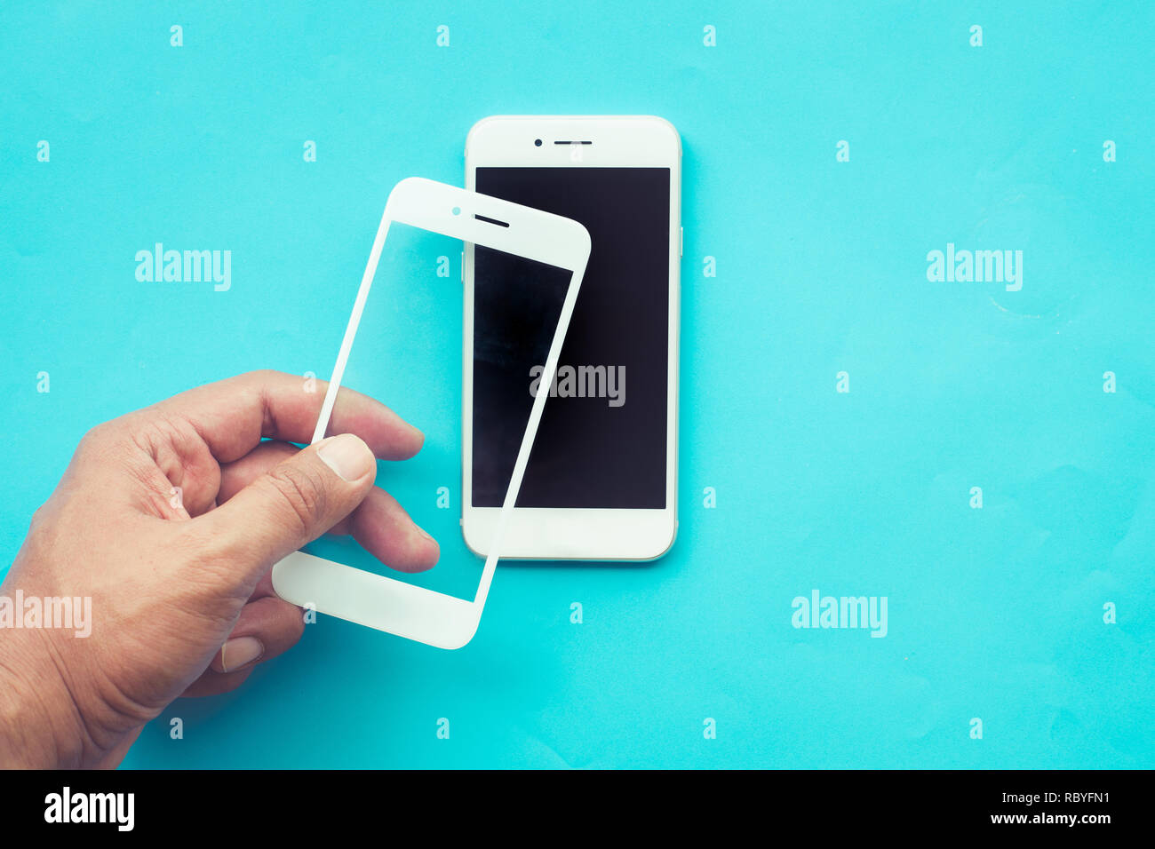 Male hand stick tempered glass shield or film screen cover with mobile