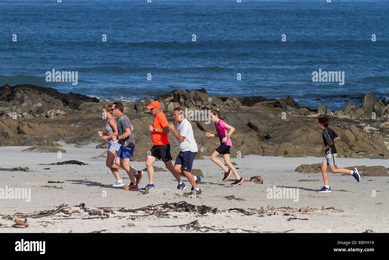Parkrun on the beach at Melkbosstrand, South Africa. Parkrun is a global movement of Saturday 5km runs outside. Stock Photo