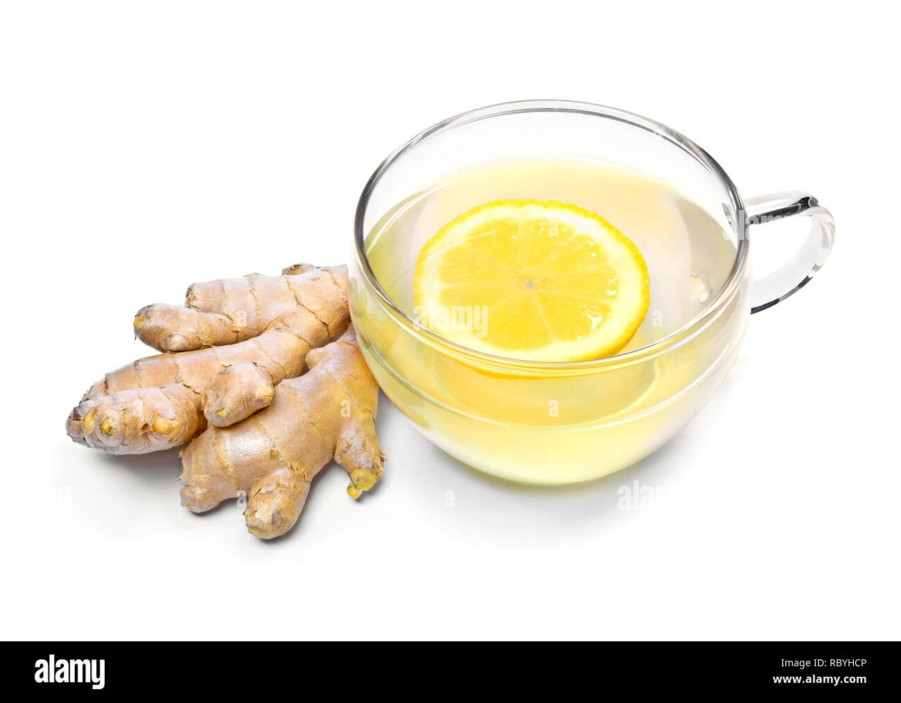 Ginger tea with lemon slice and glass cup. Healthy tea time with fresh ginger root. Natural medicine scene, top view. Isolated on white background. Stock Photo