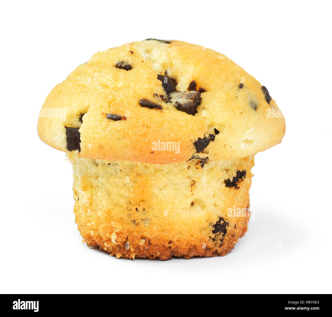 Delicious vanilla muffin or chocolate chip cupcake, isolated on white background. Muffin and paper, sweet food or unhealthy eating theme. Stock Photo