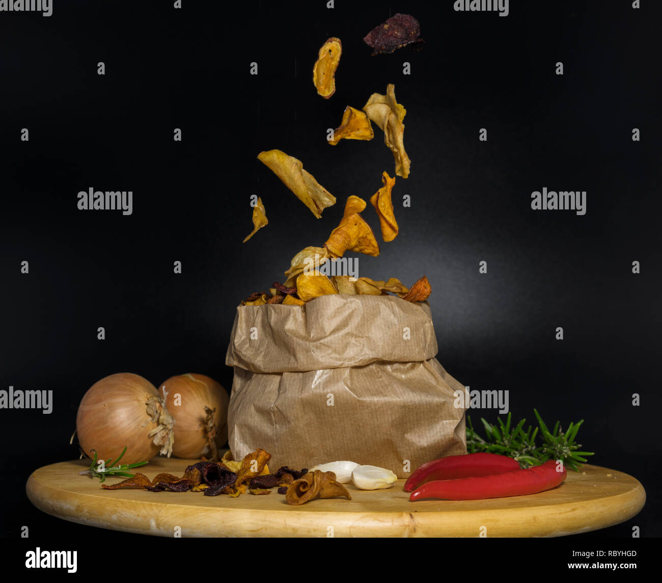 healthy chips made from vegetables or vegetable chips falling in a