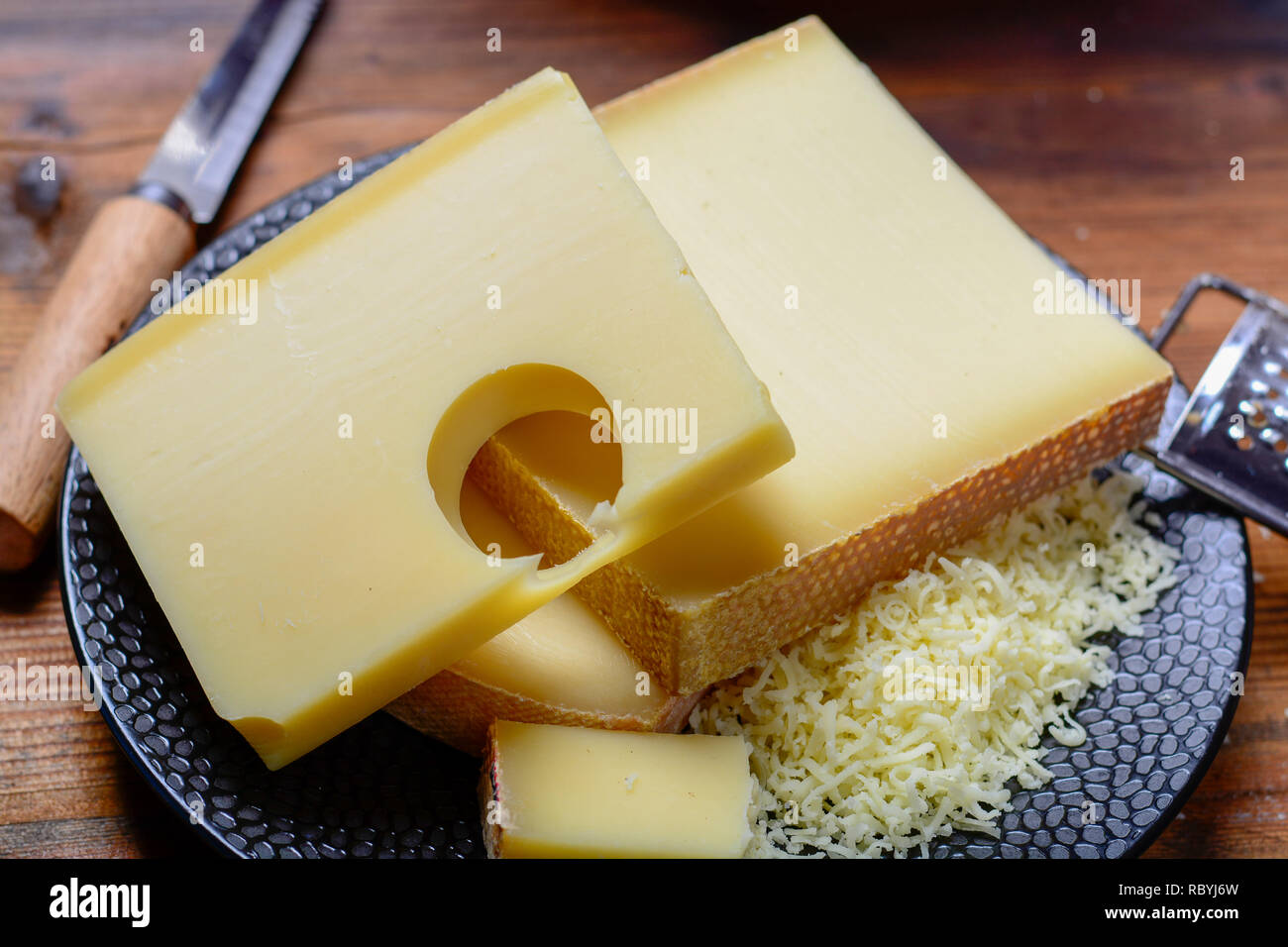 Assortment of Swiss cheeses Emmental or Emmentaler mediumhard cheese