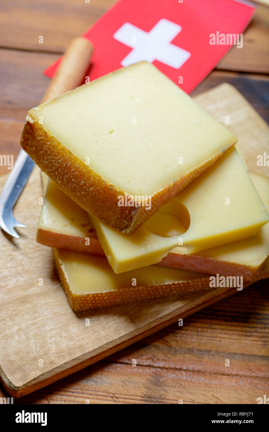 Assortment of Swiss cheeses Emmental or Emmentaler mediumhard cheese