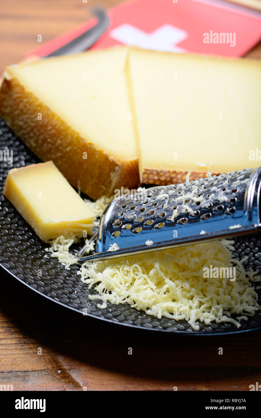 Assortment of Swiss cheeses Emmental or Emmentaler mediumhard cheese