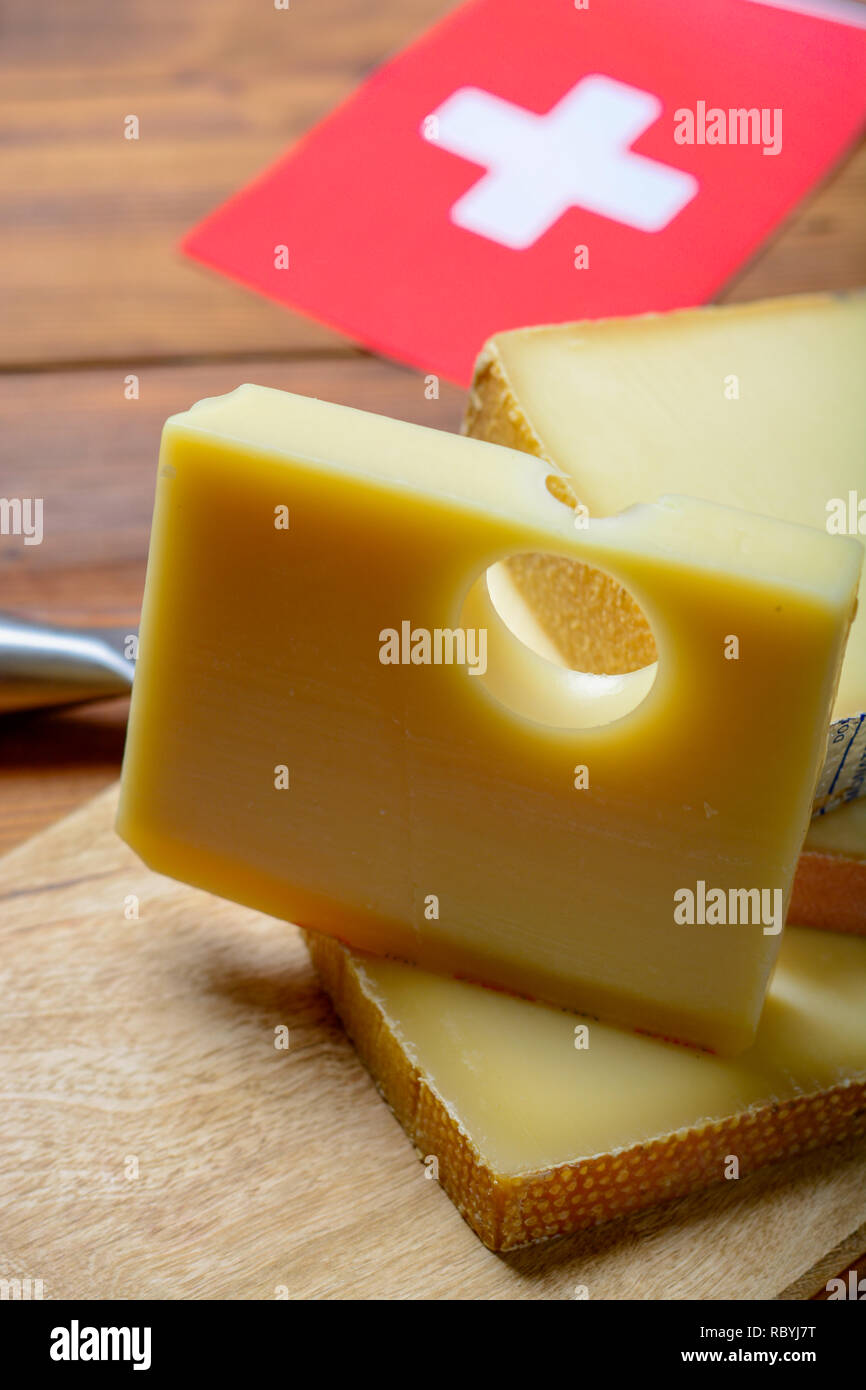 Assortment of Swiss cheeses Emmental or Emmentaler mediumhard cheese