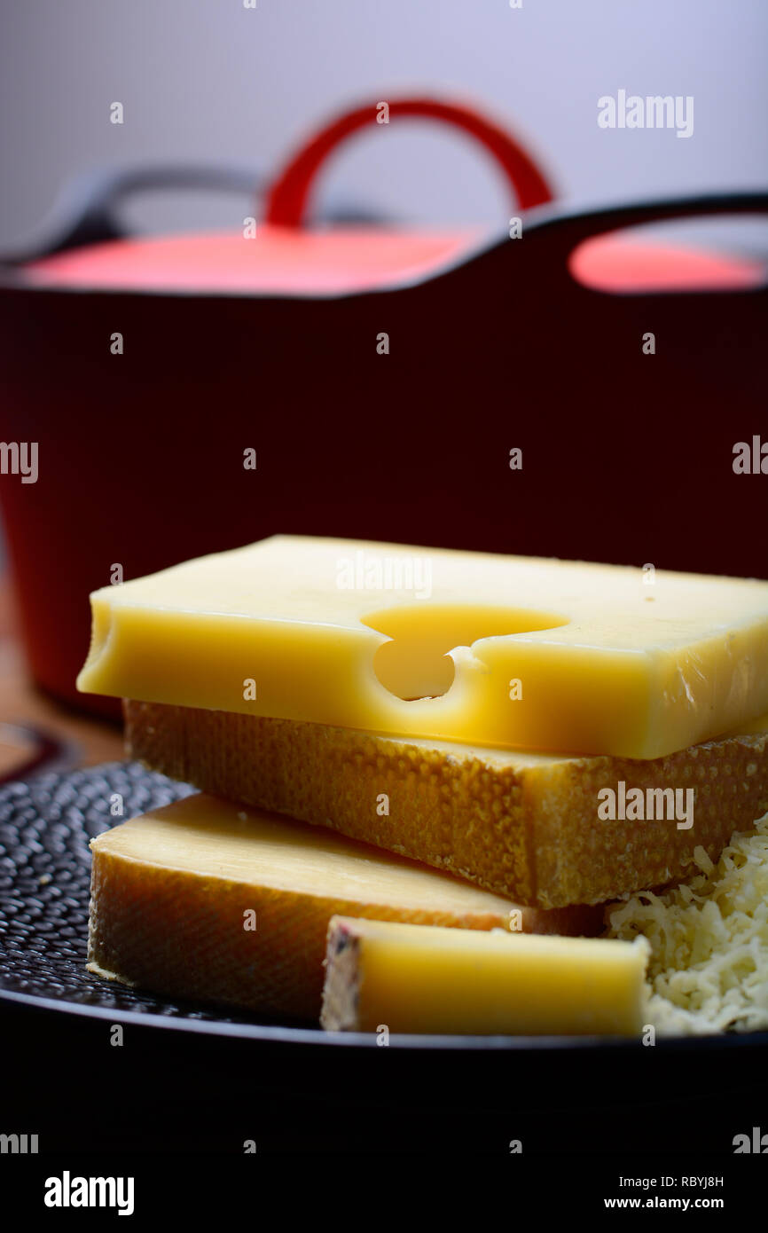 Assortment of Swiss cheeses Emmental or Emmentaler mediumhard cheese