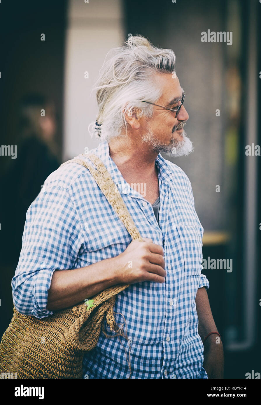 Manly, Australia-October 15, 2018: Mature attractive walks through the streets of manly , Sydney. Stock Photo