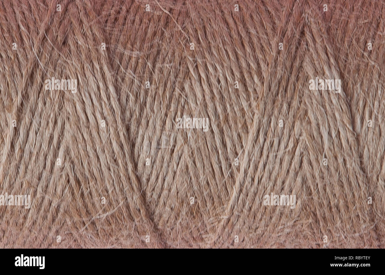 Texture of coil of coarse linen rope Stock Photo - Alamy