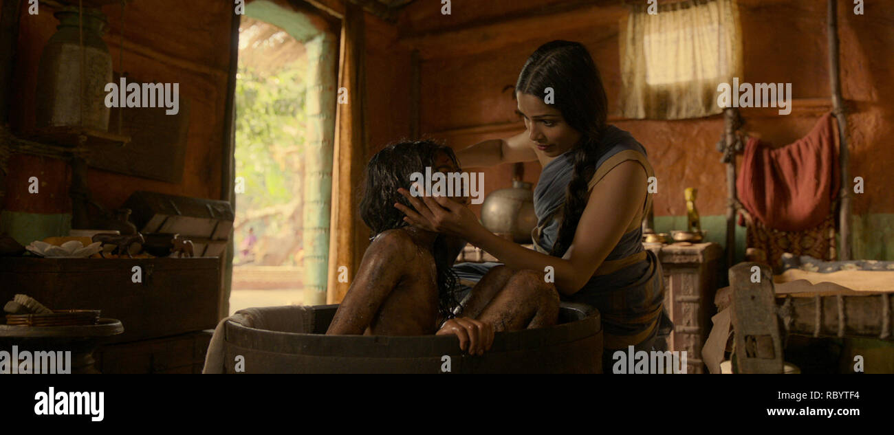 Rohand Chand, Frieda Pinto, 'Mowgli: Legend of the Jungle' (2018)  Credit: Netflix / The Hollywood Archive Stock Photo