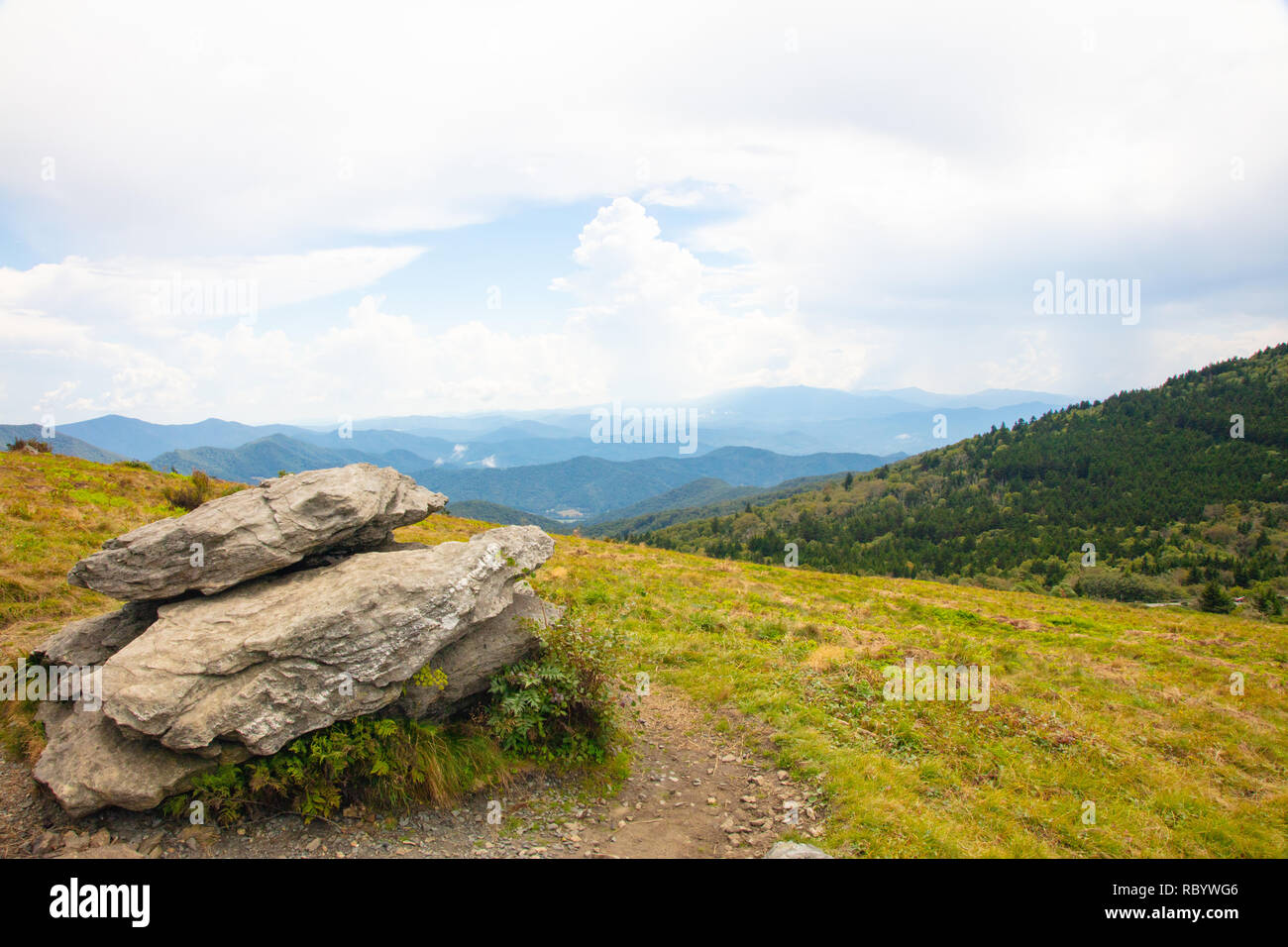 View of meadow and mountains from the Roan Highlands on Round Bald near Roan Mountain Stock Photo