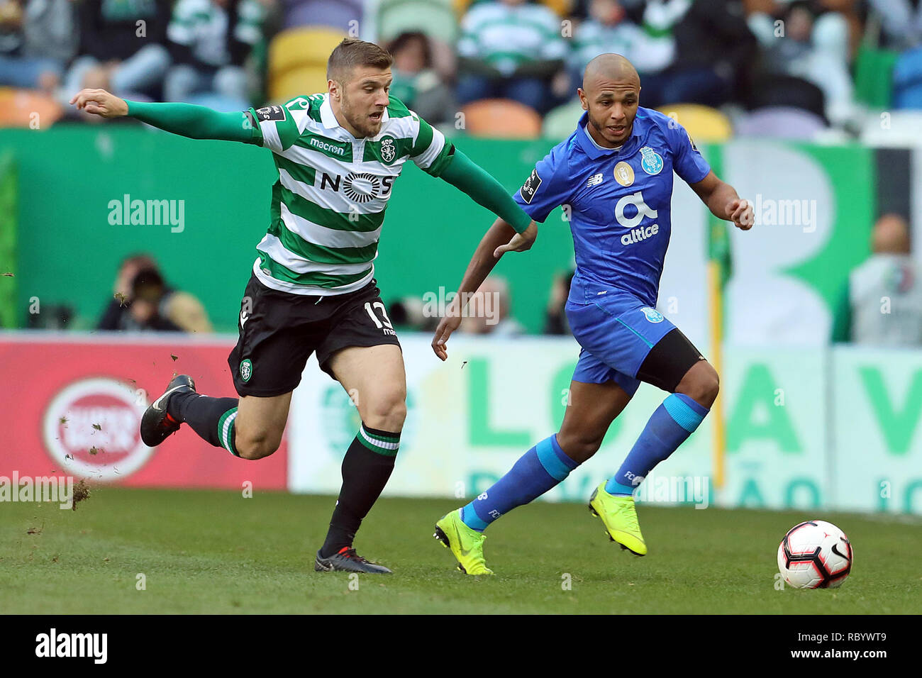 Stefan Ristovski of Sporting CP (L) and Yacine Brahimi of FC Porto (R) are seen in action during the League NOS 2018/19 football match between Sporting CP vs FC Porto. (Final score: Sporting CP 0 - 0 FC Porto) Stock Photo