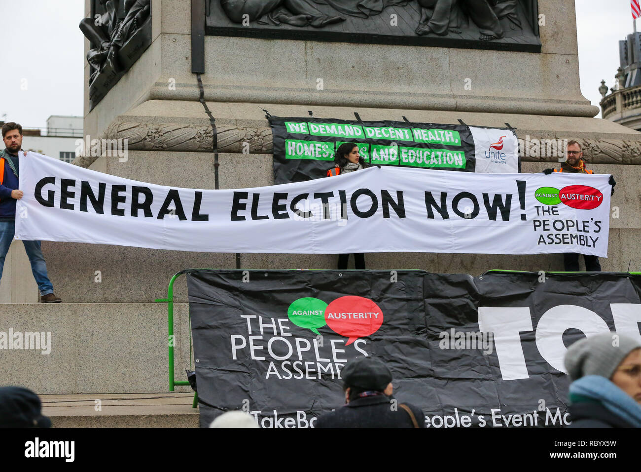 A large "General Election Now" banner is seen during the Britain is Broken protest organised by People's Assembly Against Austerity calling for a General Election. Stock Photo
