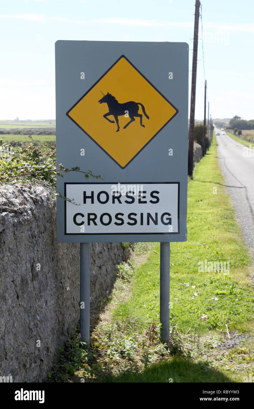 Horses Crossing sign in Ireland altered to appear like a Unicorn. Stock Photo