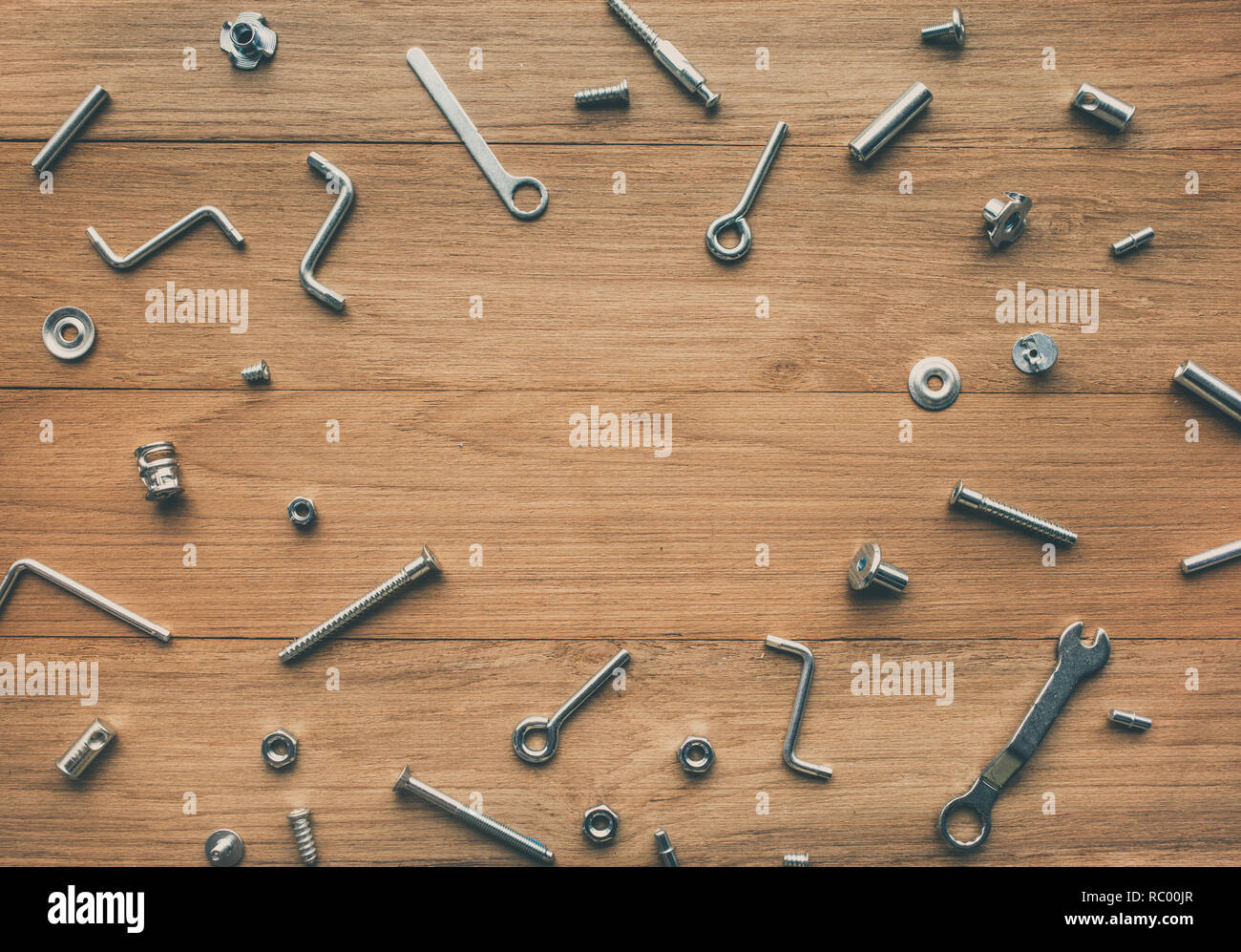 Collection set of house repair tools, wrenchs, screw, bolts on wood table background,flat lay pattern design Stock Photo