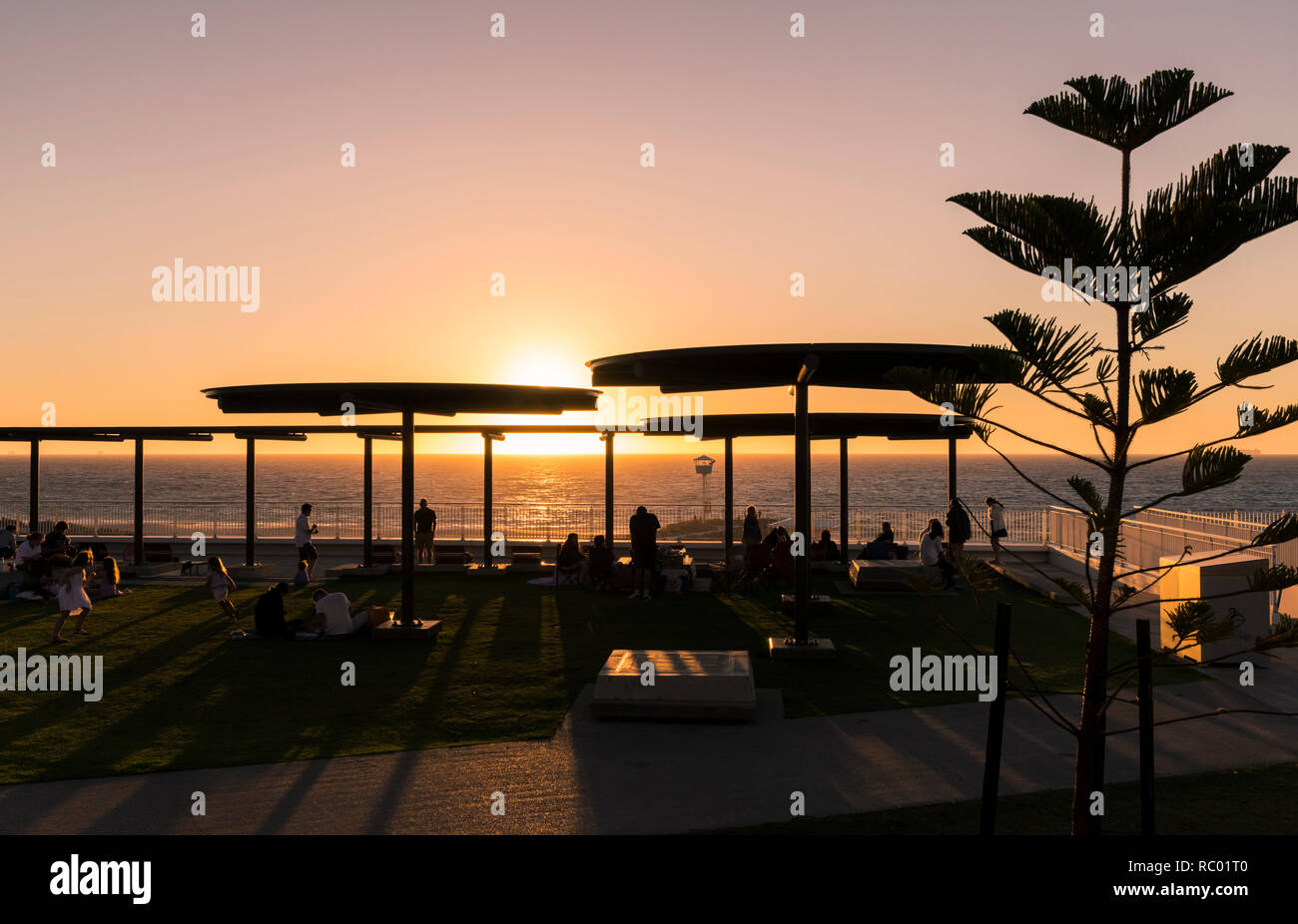 Sunset silhouette over City Beach, Western Australia Stock Photo