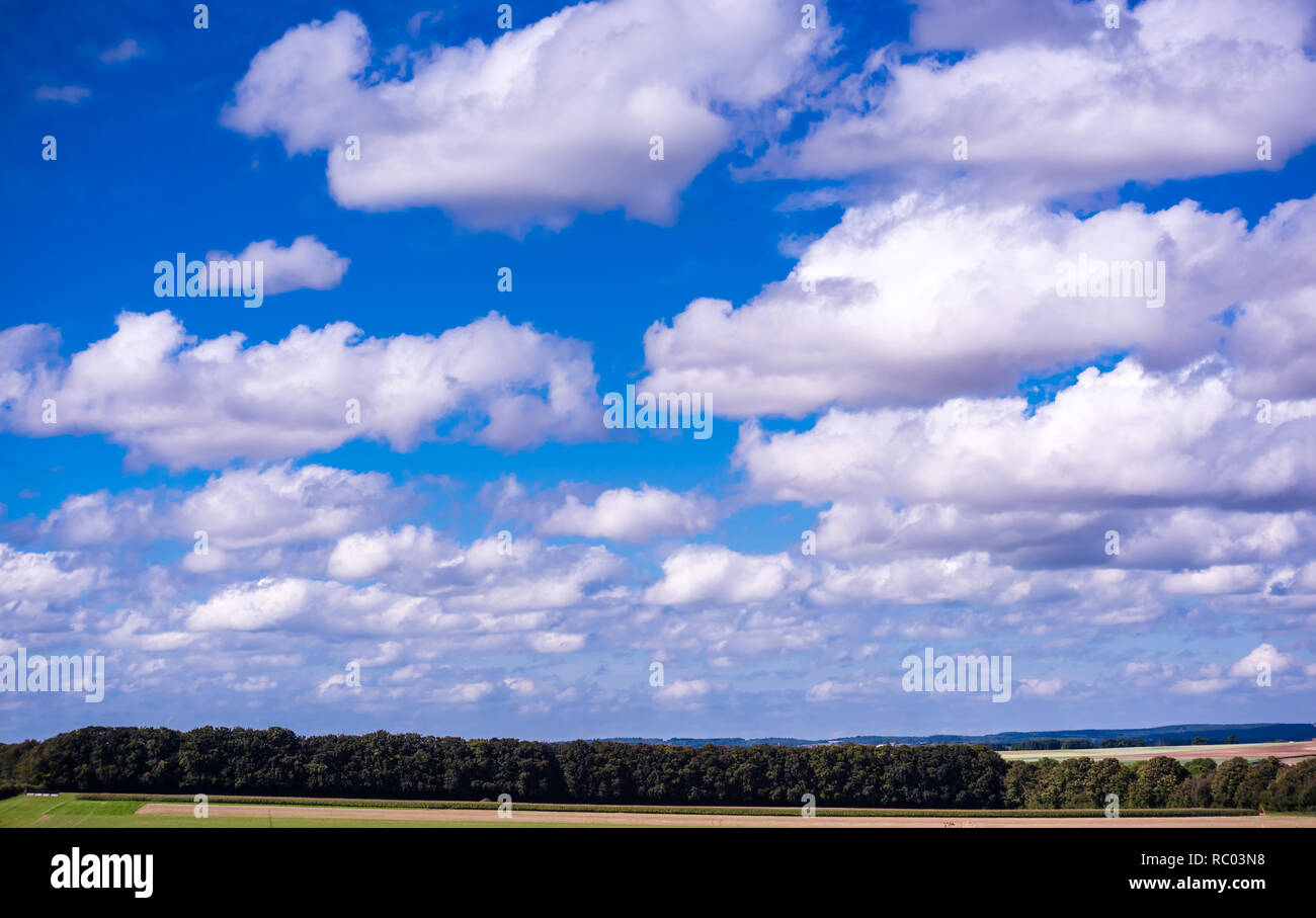 Cumulus clouds crowding the Dorset Sky. Stock Photo