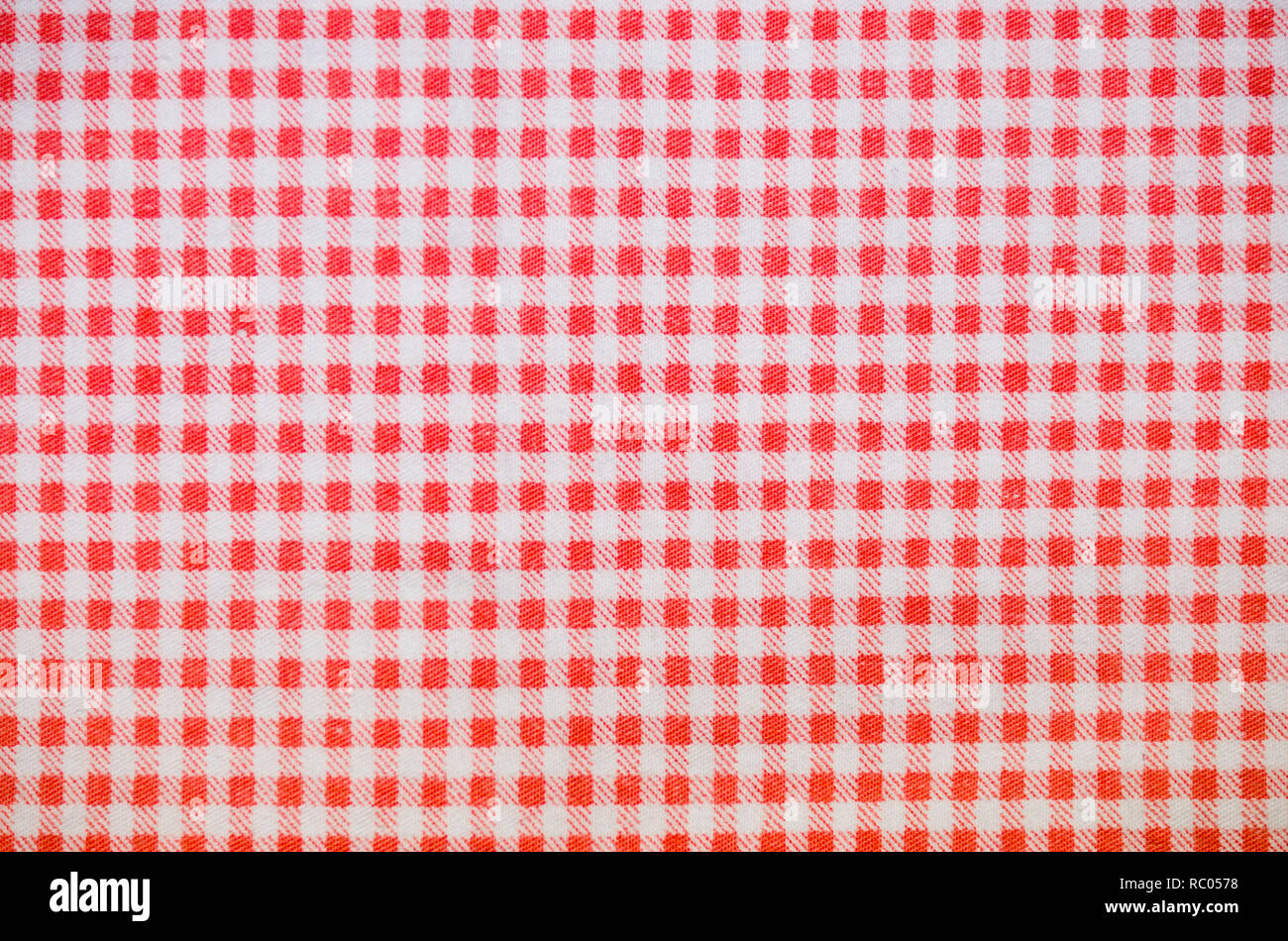 red textile checkered towel texture. background, kitchen. Stock Photo