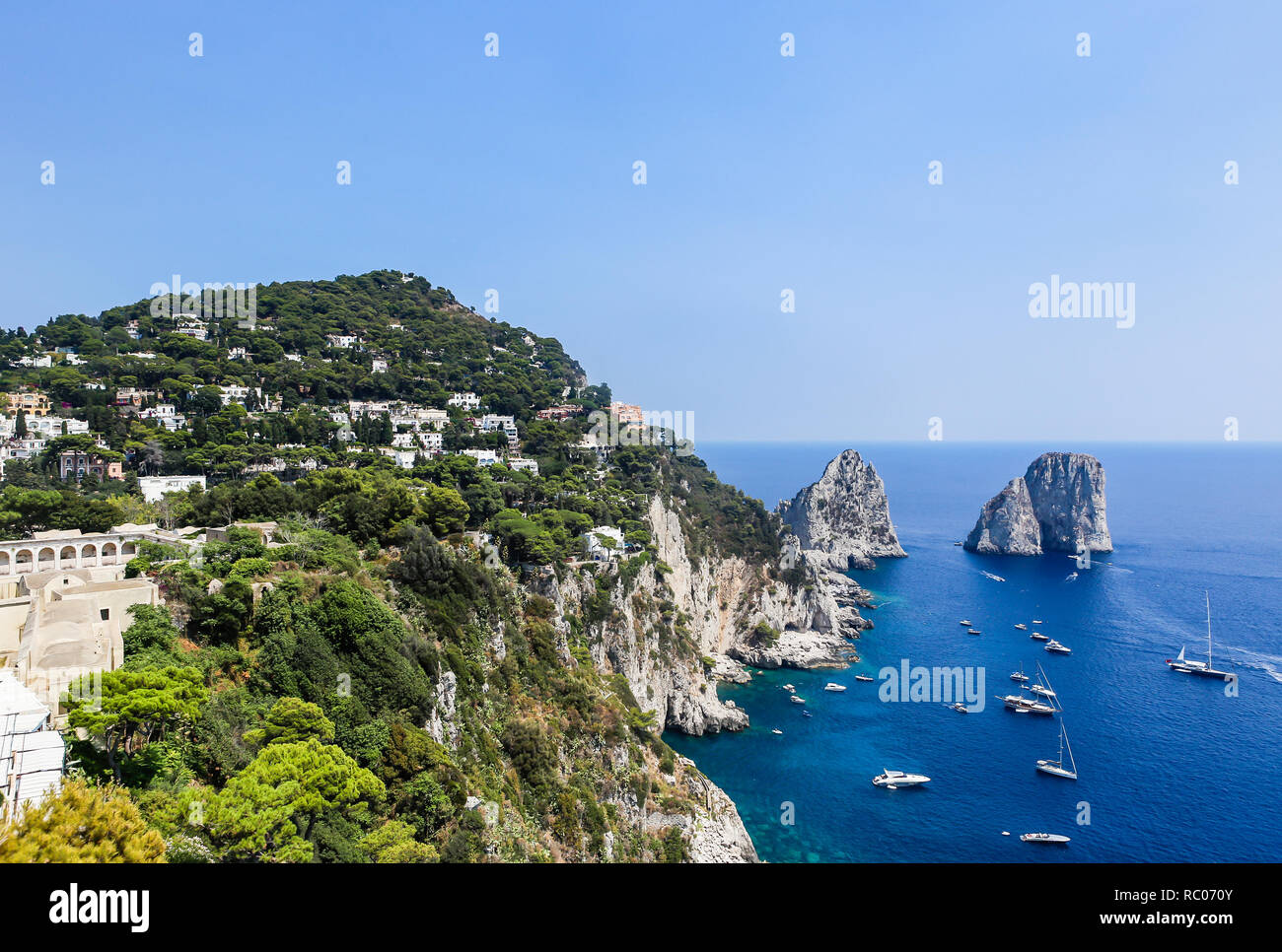 Faraglio Rocks Italy. Capri Island. Faraglioni rock formation seen from Gardens of ...