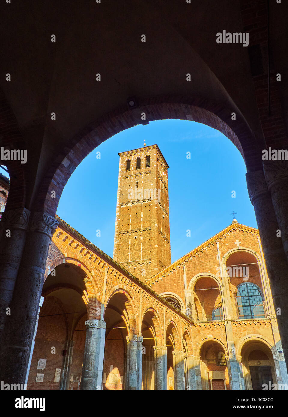 View of the west facade from the Ansperto Atrium of the Basilica of Sant'Ambrogio. Milan, Lombardy, Italy. Stock Photo