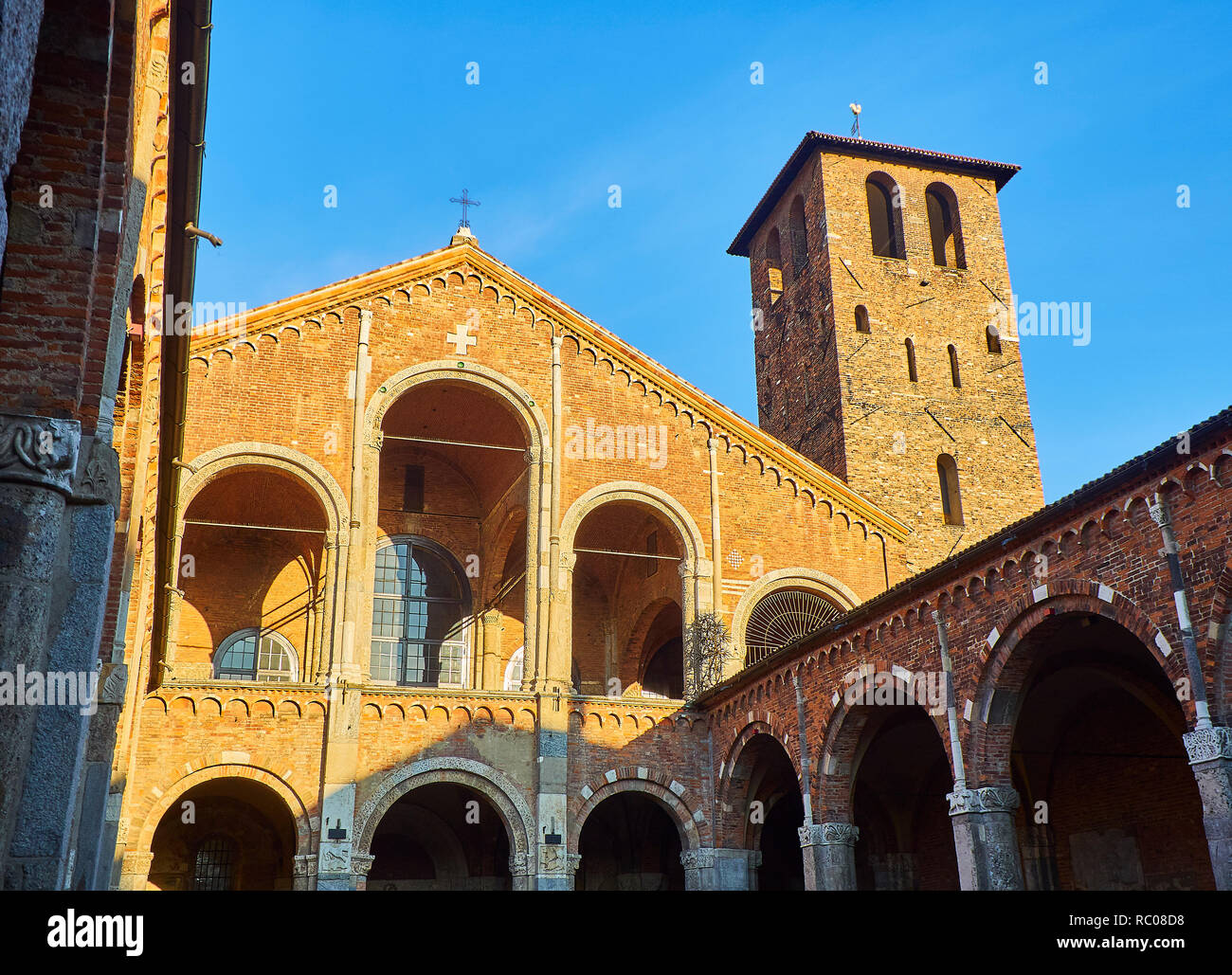 View of the west facade from the Ansperto Atrium of the Basilica of Sant'Ambrogio. Milan, Lombardy, Italy. Stock Photo