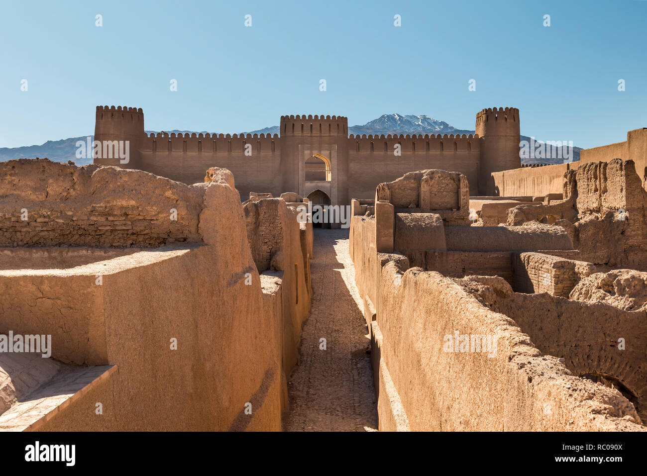 Frontal view of an adobe castle Rayen close to the town Kerman under mountain Haraz, Iran Stock Photo