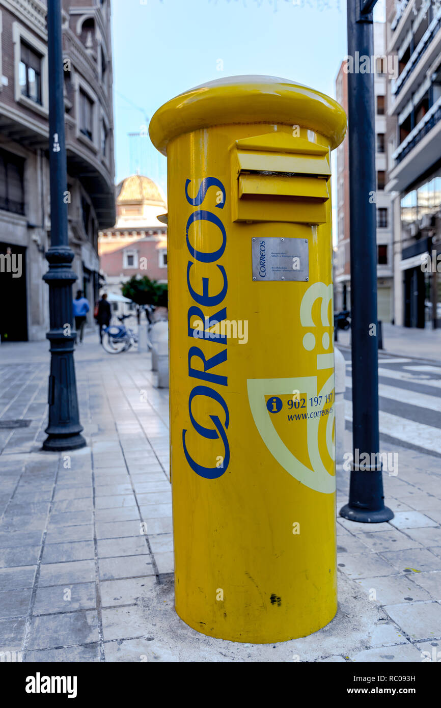 Correos Spain, yellow inbox. Correos, is the national postal service of  Spain. Its one of the largest postal services in the world. Based in Madrid  Stock Photo - Alamy