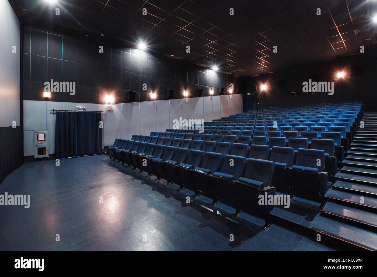 Russia, Nizhny Novgorod - may 26, 2014: Sormovsky Cinema. Empty blue cinema  hall seats, comfortable and soft chairs. Perspective auditorium view Stock  Photo - Alamy