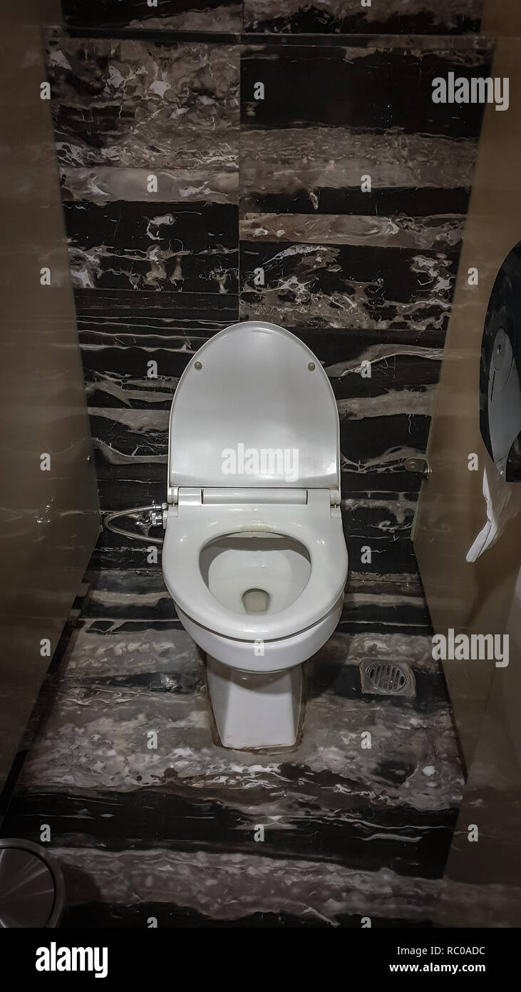 Clean toilet seat in a hotel in Asia Stock Photo
