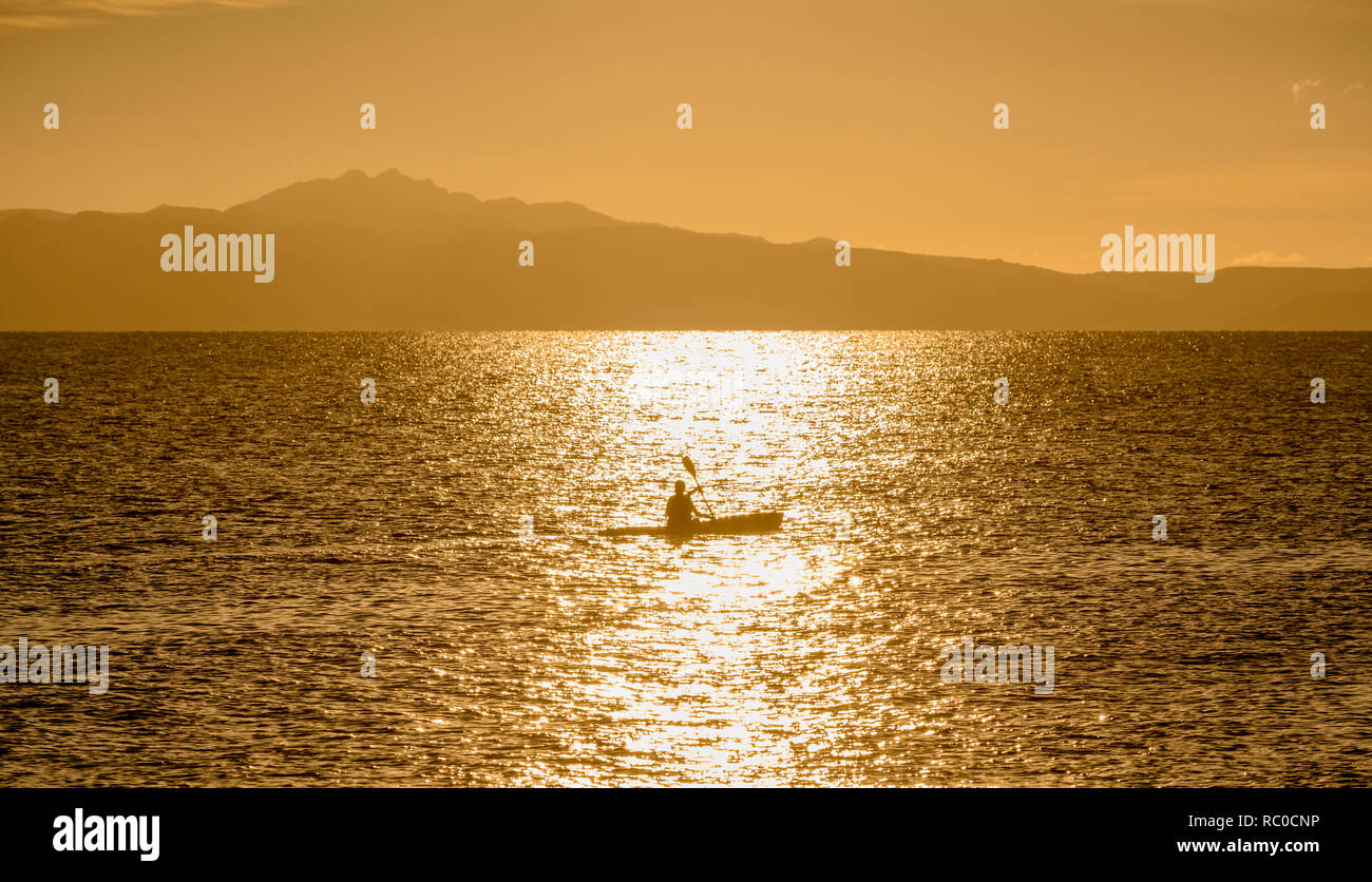 Early morning kayaking in the Sea of Cortez at Loreto, Baja California Sur, Mexico. Stock Photo