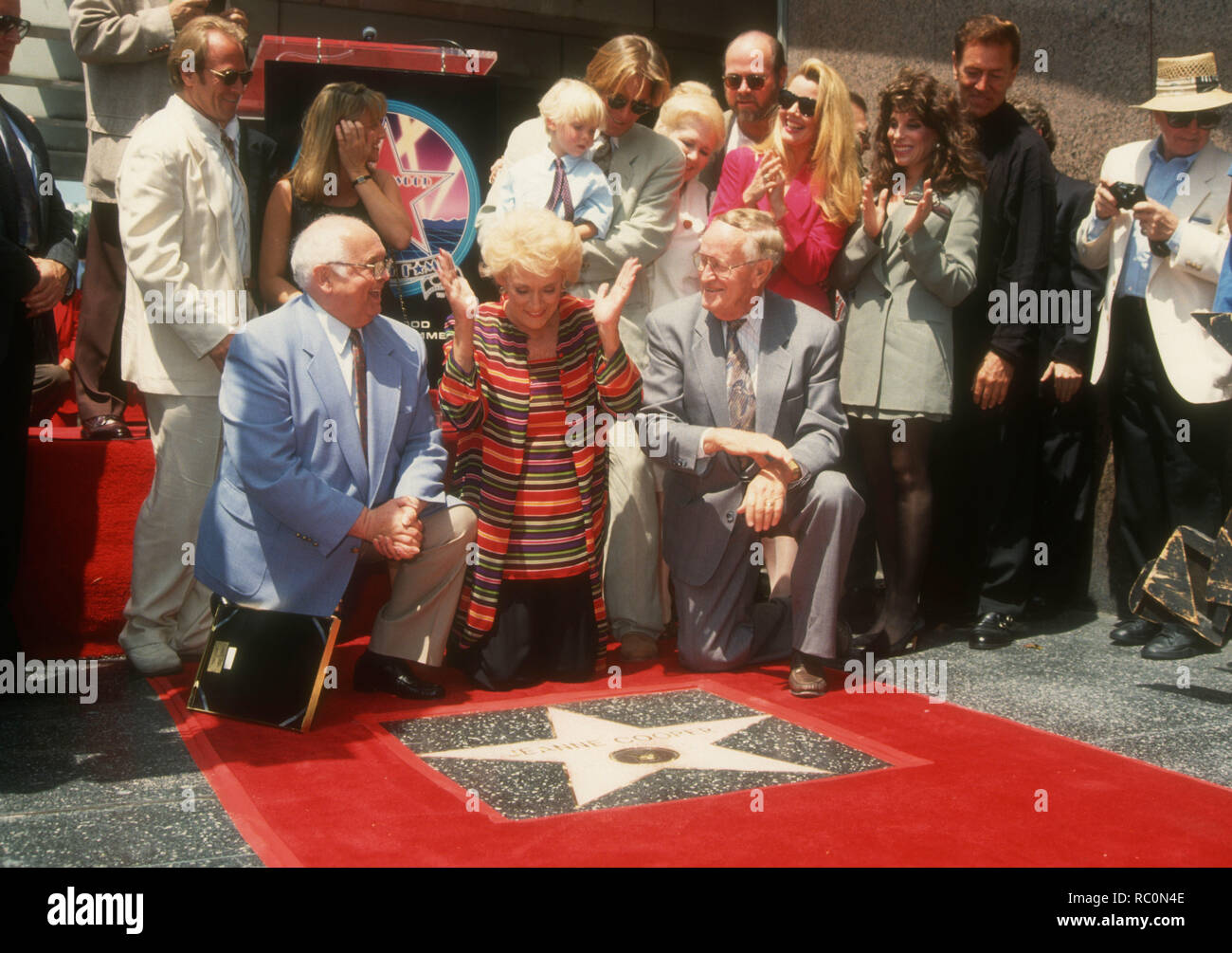 HOLLYWOOD, CA - AUGUST 20: Actor Corbin Bernsen, Johnny Grant, Caren Bernsen, actress Jeanne Cooper, Collin Bernsen, actress Melody Thomas Scott, actress Kate Linder and actor Quinn K. Redeker attend Actress Jeanne Cooper receives the 1,987th star on Hollywood Walk of Fame on August 20, 1993 on Hollywood Blvd in Hollywood, California. Photo by Barry King/Alamy Stock Photo Stock Photo