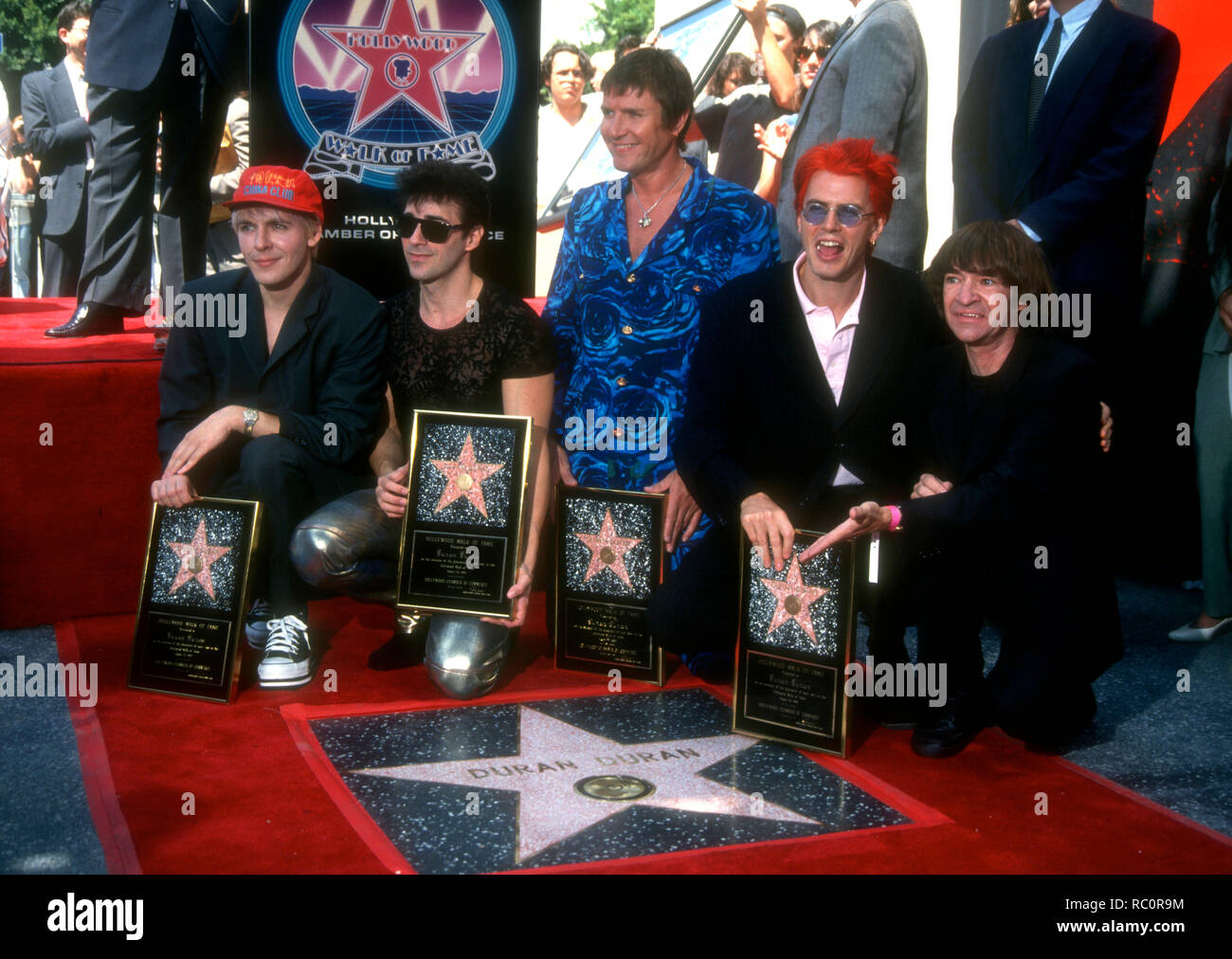 HOLLYWOOD, CA - AUGUST 23: Musicians/singers Nick Rhodes, Warren Cuccurullo, Simon Le Bon and John Taylor of Duran Duran and DJ Rodney Bingenheimer attend the Hollywood Walk of Fame Ceremony Honoring Duran Duran with a Walk of Fame Star on August 23, 1993 at 1770 Vine Street in Hollywood, California. Photo by Barry King/Alamy Stock Photo Stock Photo