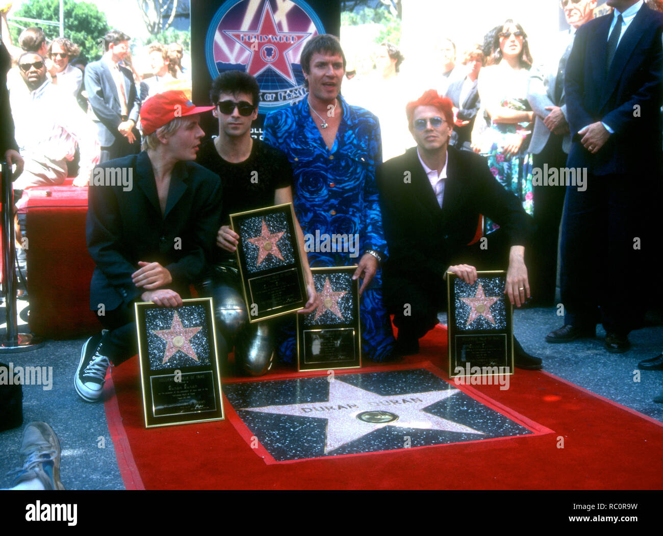 HOLLYWOOD, CA - AUGUST 23: Musicians/singers Nick Rhodes, Warren Cuccurullo, Simon Le Bon and John Taylor of Duran Duran attend the Hollywood Walk of Fame Ceremony Honoring Duran Duran with a Walk of Fame Star on August 23, 1993 at 1770 Vine Street in Hollywood, California. Photo by Barry King/Alamy Stock Photo Stock Photo