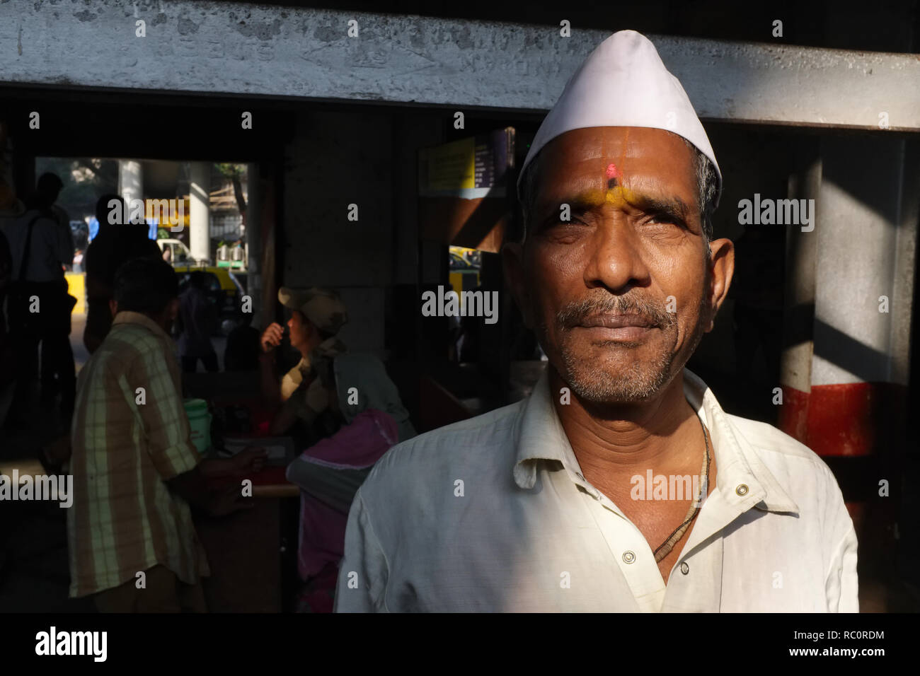 Portrait of a Maharashtrian, a man from the state of Maharashtra, in Mumbai, India, wearing the traditional Nehru or Gandhi cap Stock Photo