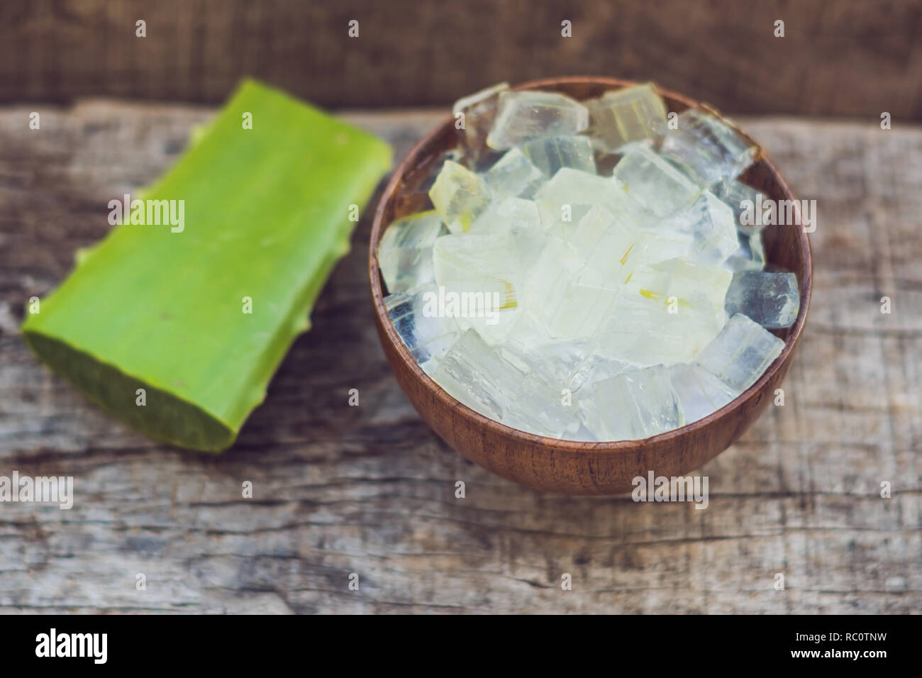 Aloe vera and aloe cubes in a wooden bowl. Aloe Vera gel almost use in  food, medicine and beauty industry Stock Photo - Alamy