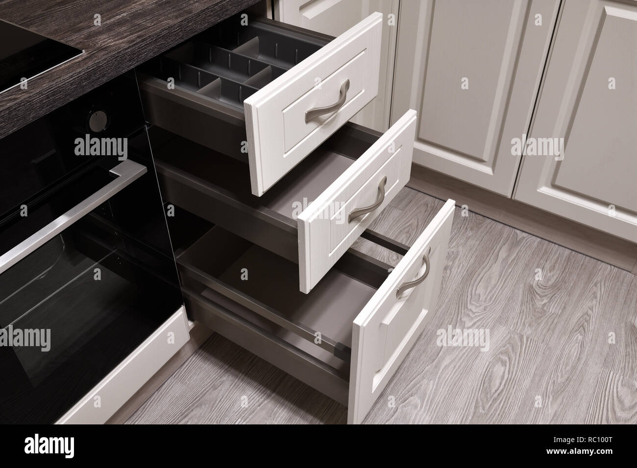 An open drawers in the kitchen table Stock Photo