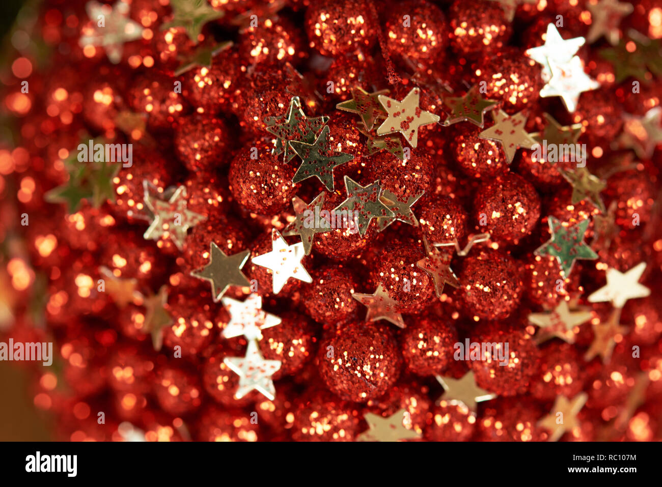 Gold stars and red balls on blur christmas background Stock Photo