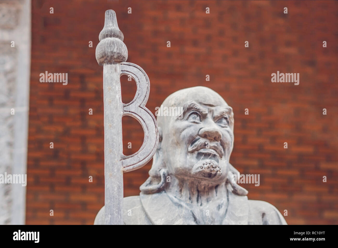 Ancient Monument of a Monk with a Stick and the Letter B. Looks Like Bitcoin  God Stock Photo - Alamy
