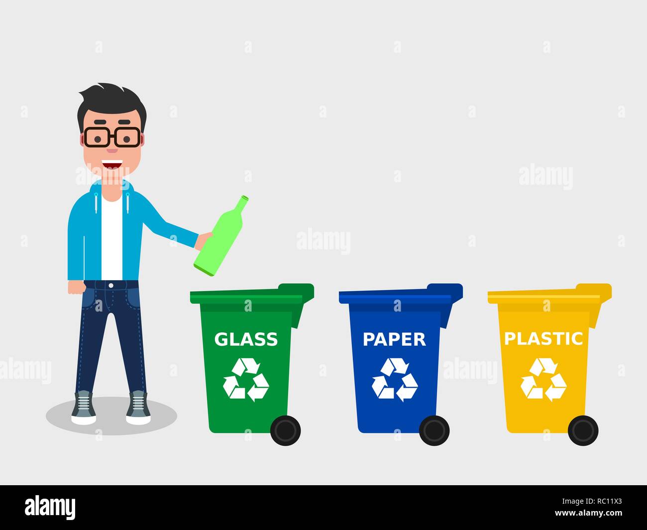 Young man throwing a glass bottle in an appropriate recycle bin. There