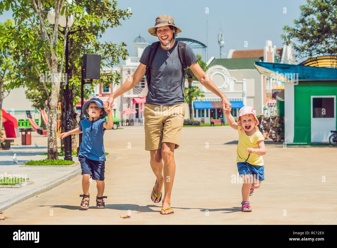 Multi generation family playing in park hi-res stock photography and ...
