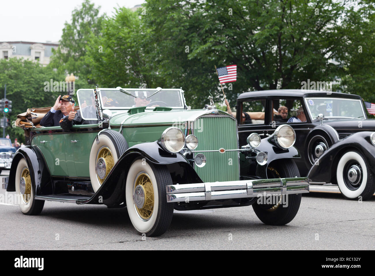 Washington, D.C., USA - May 28, 2018: The National Memorial Day Parade, a Pierce Arrow Classic car with Military veterans, going down Constitution Ave Stock Photo