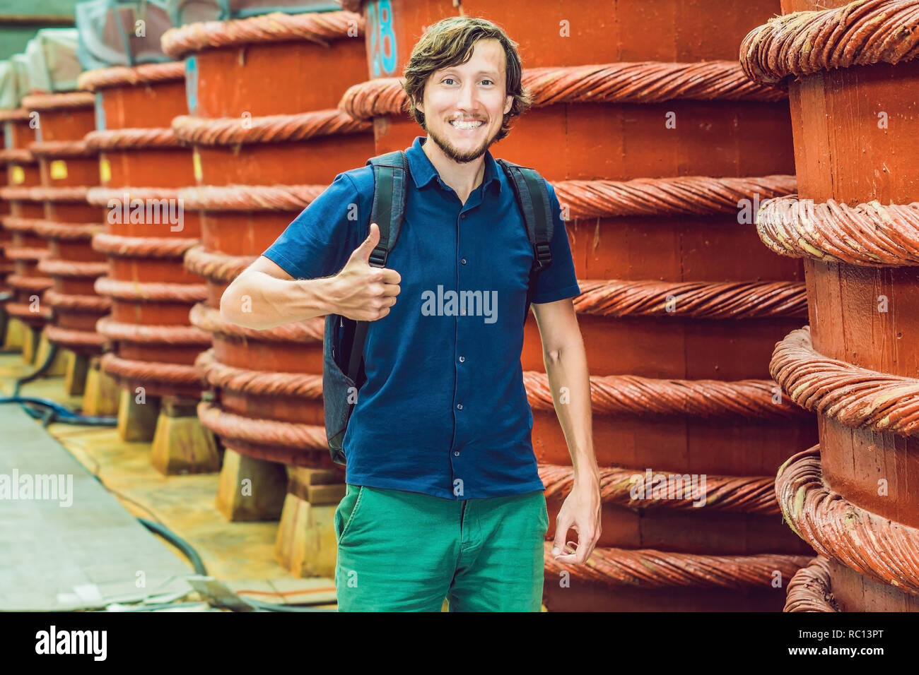 young man traveler show how they like fish sauce on Phu Quoc, Vietnam Stock Photo